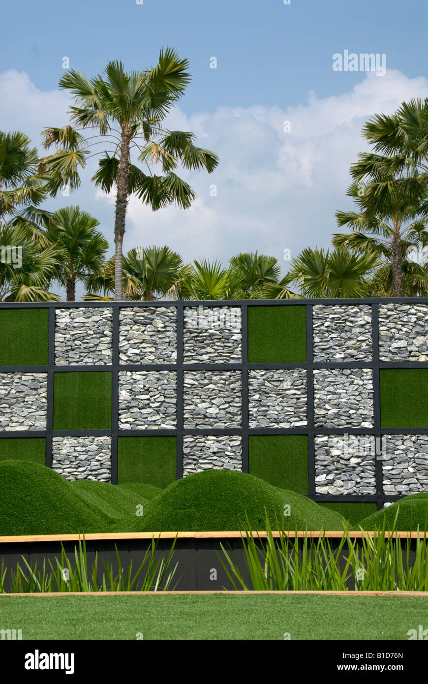 Designer garden featuring small grassy mounds and a checker patterned ...