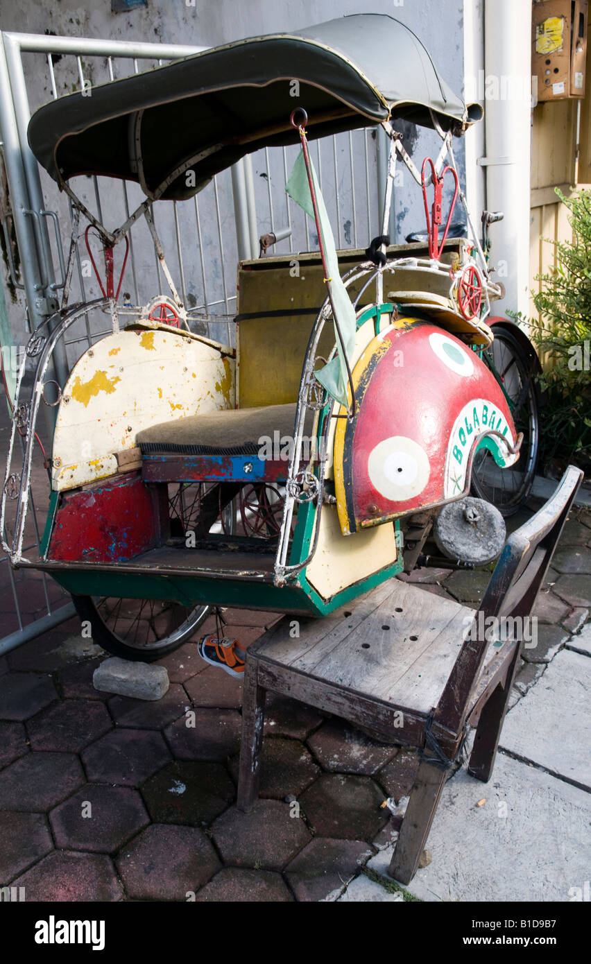 Indonesia Java Island Yogyakarta Bicycle trishaw with missing wheel Stock Photo