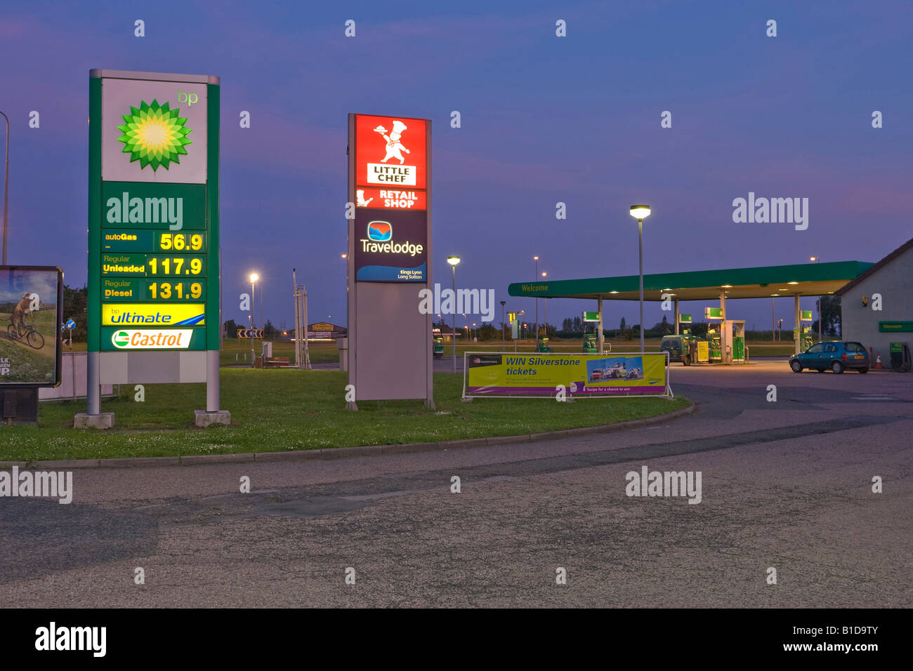 BP petrol station and Little Chef sign in evening Stock Photo