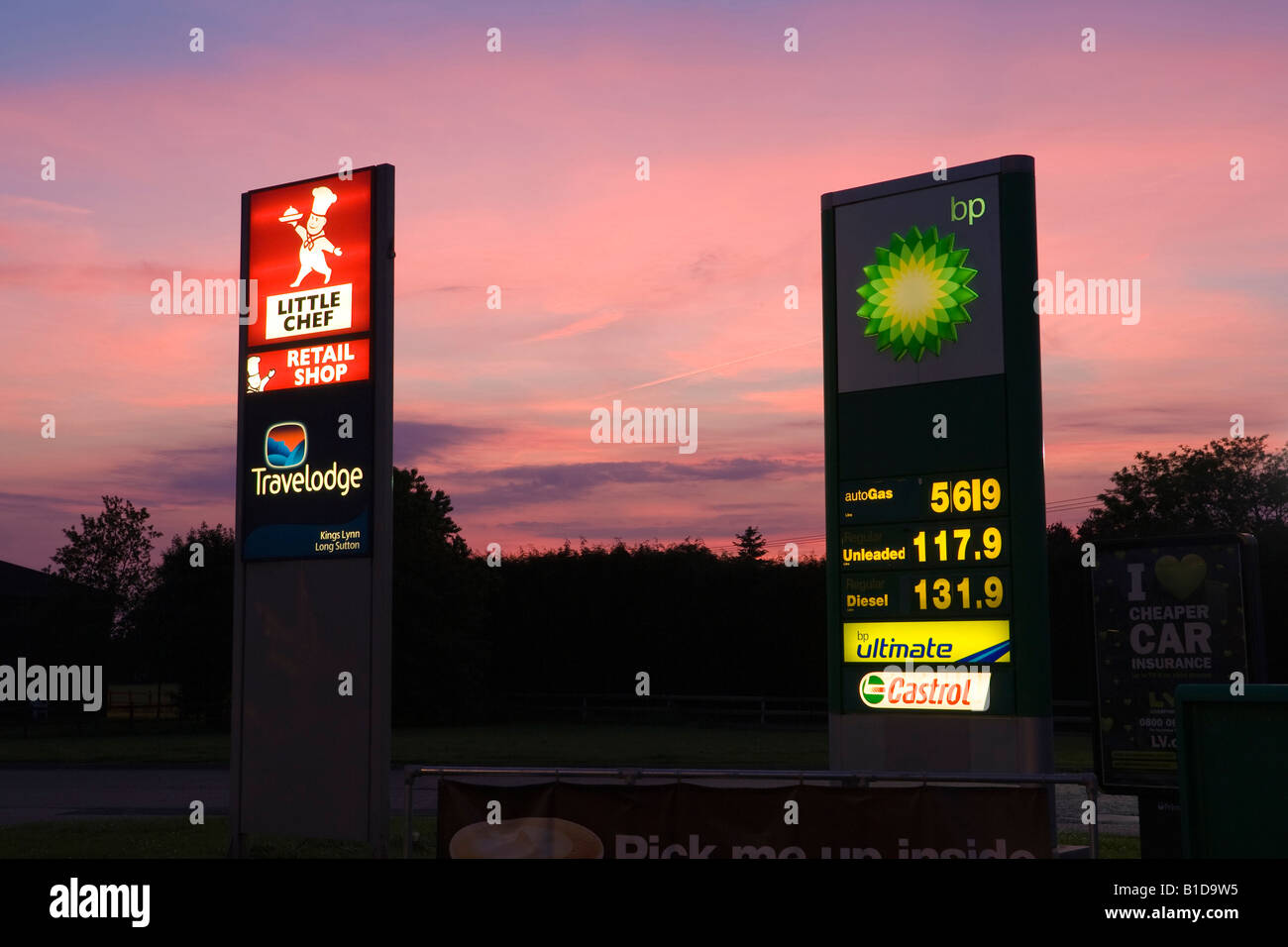 BP petrol station and Little Chef sign at sunset Stock Photo