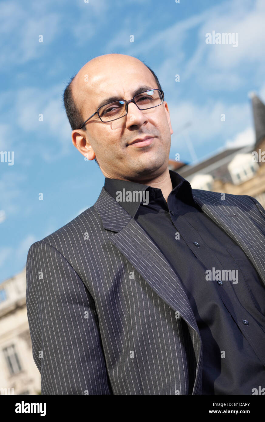 Portrait of Aneel Mussarat founder of the MCR Property Group Stock