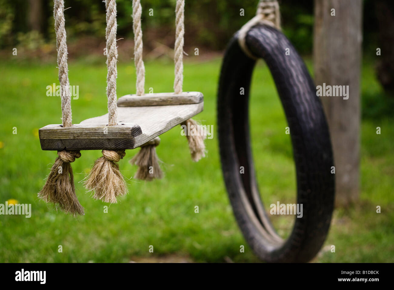 old fashioned swings in the countryside Stock Photo