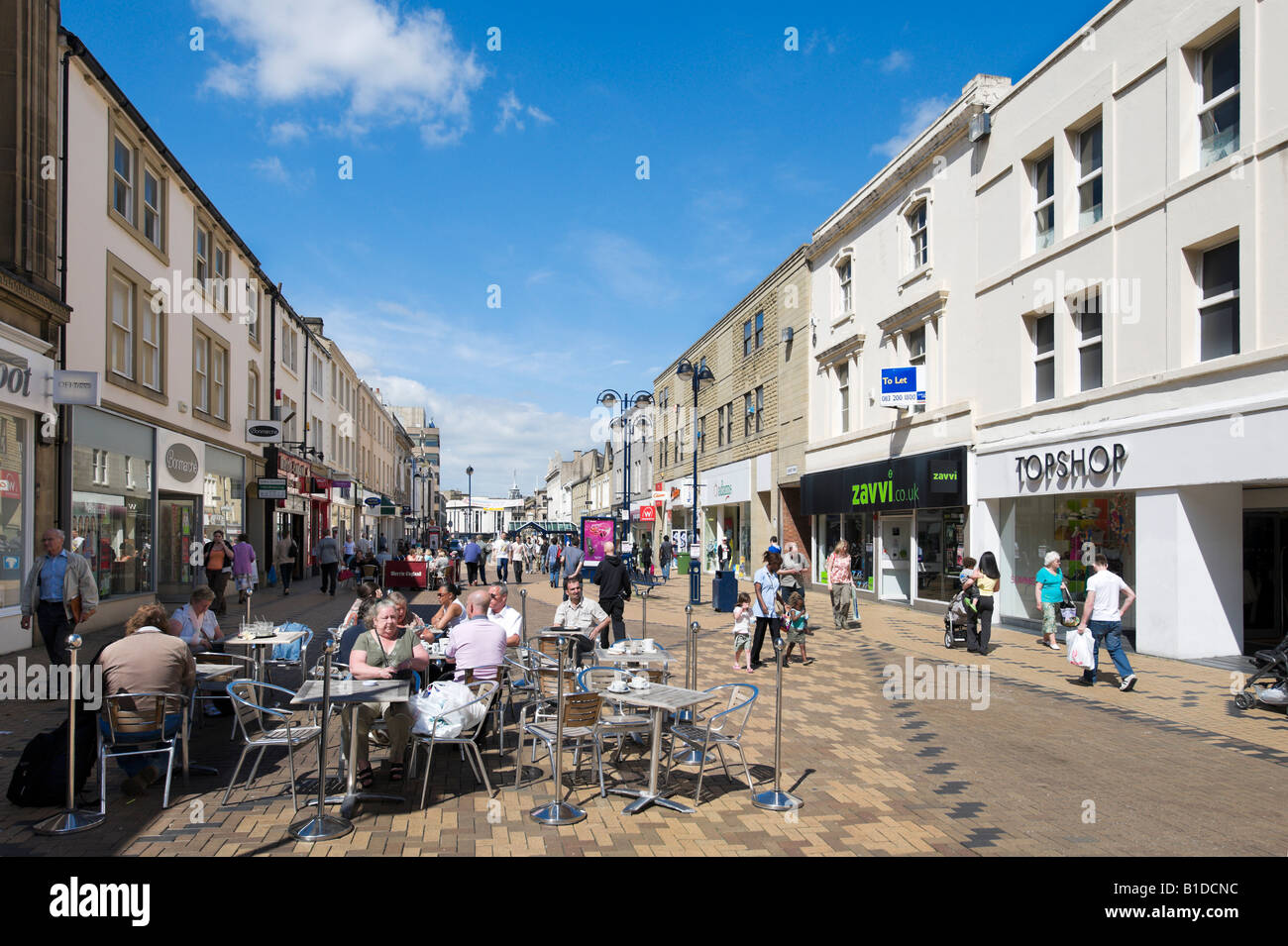 Cafe and shops in the pedestrian shopping area, New Street, Huddersfield,  West Yorkshire, England, United Kingdom Stock Photo - Alamy