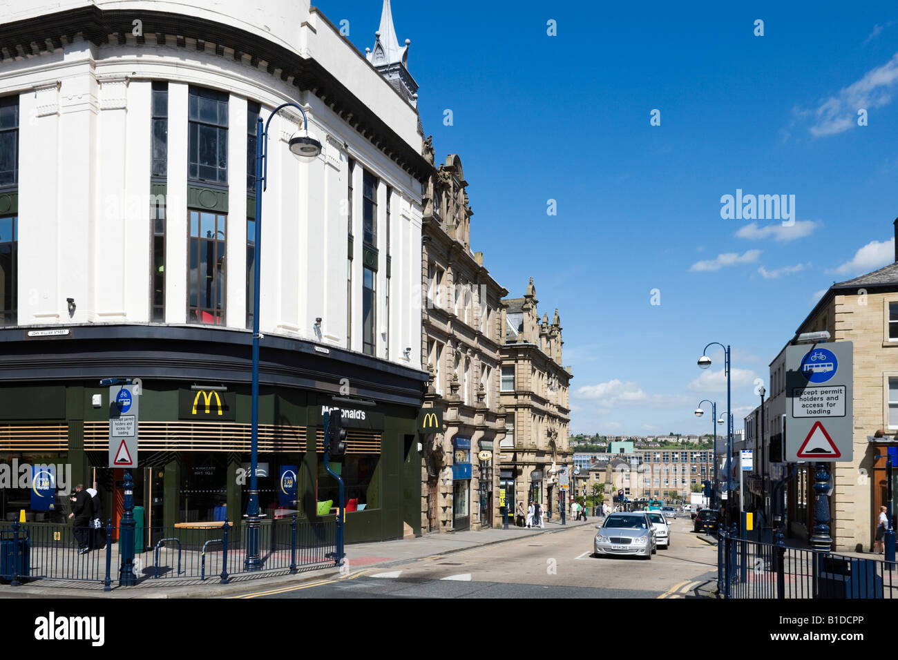 Junction of Kirkgate and John William Street in the town centre, Huddersfield, West Yorkshire, England, United Kingdom Stock Photo