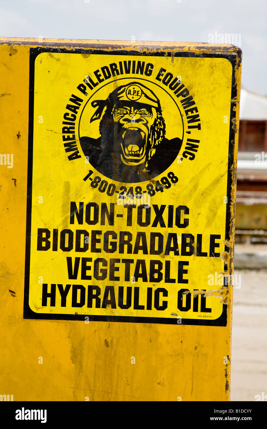 Sign indicating hydraulic pile driving equipment uses non-toxic biodegradable vegetable hydraulic oil Stock Photo