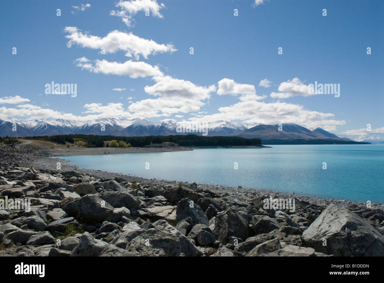 The rocky shores of Lake Pukaki in New Zealands South Island Stock ...