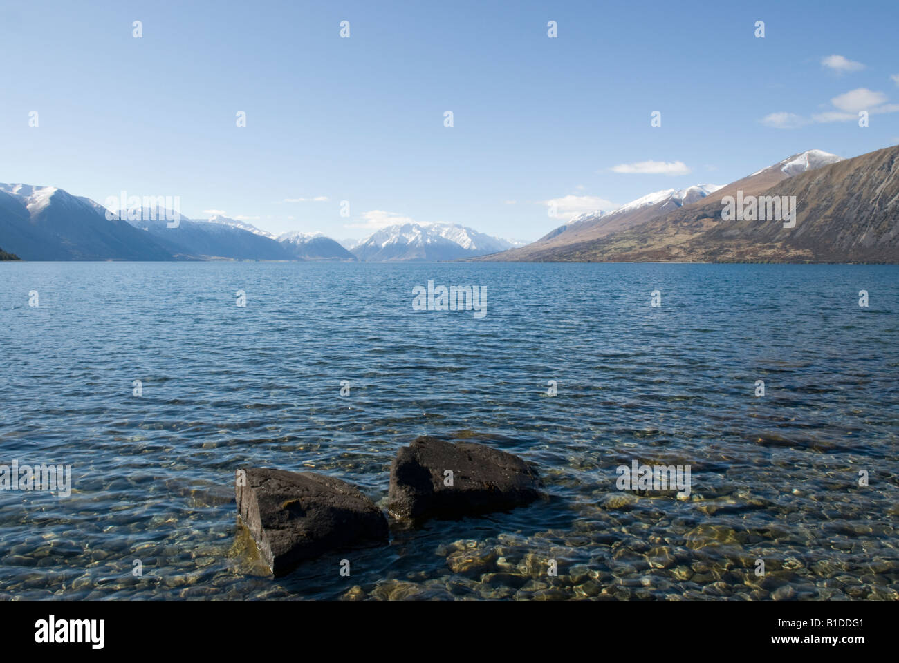 Rocks on the shores of Lake Ohau South Island New Zealand Stock Photo ...