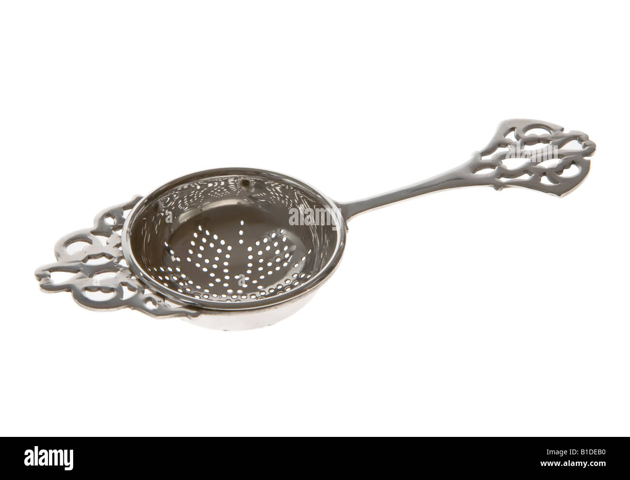 Antique silver tea strainer Stock Photo Alamy