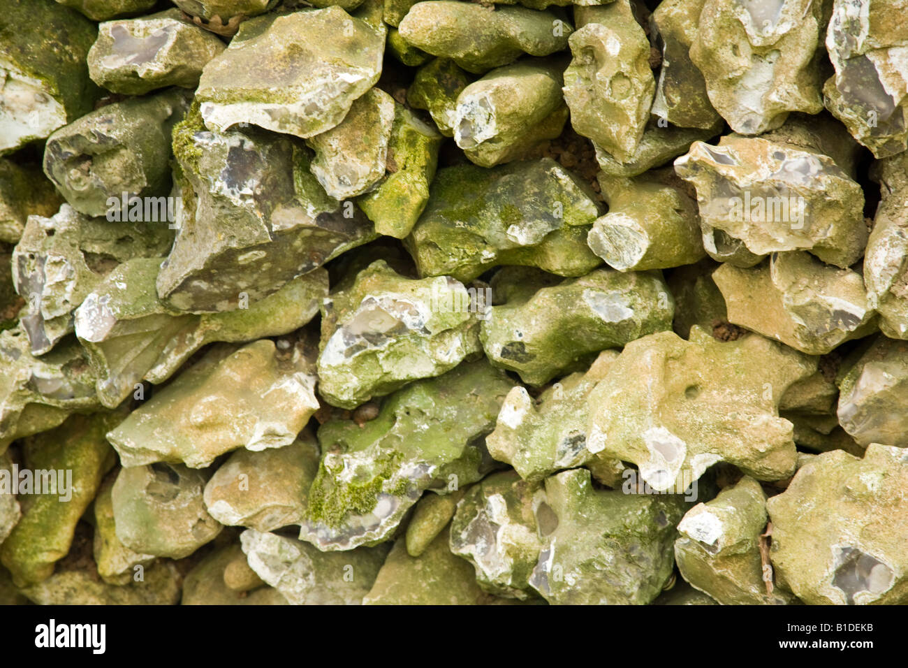 Stone wall made of flints Hampshire England Stock Photo