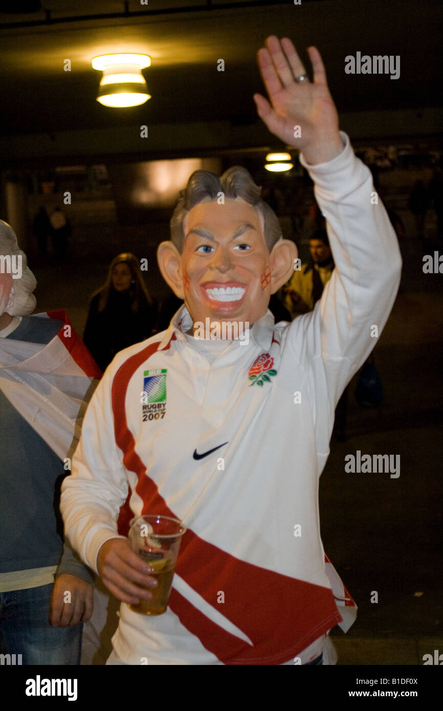 English rugby fan wearing Prince Charles face mask and holding pint of beer at the Rugby World Cup Final, Stade de France, Paris Stock Photo