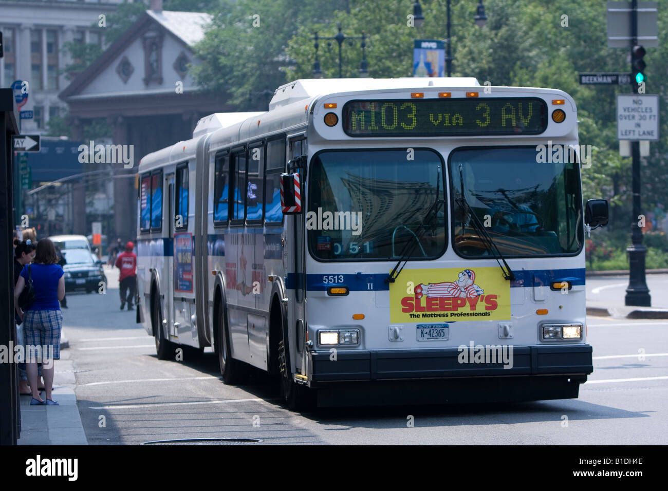 An articulated MTA bus in Manhattan, NY. Stock Photo