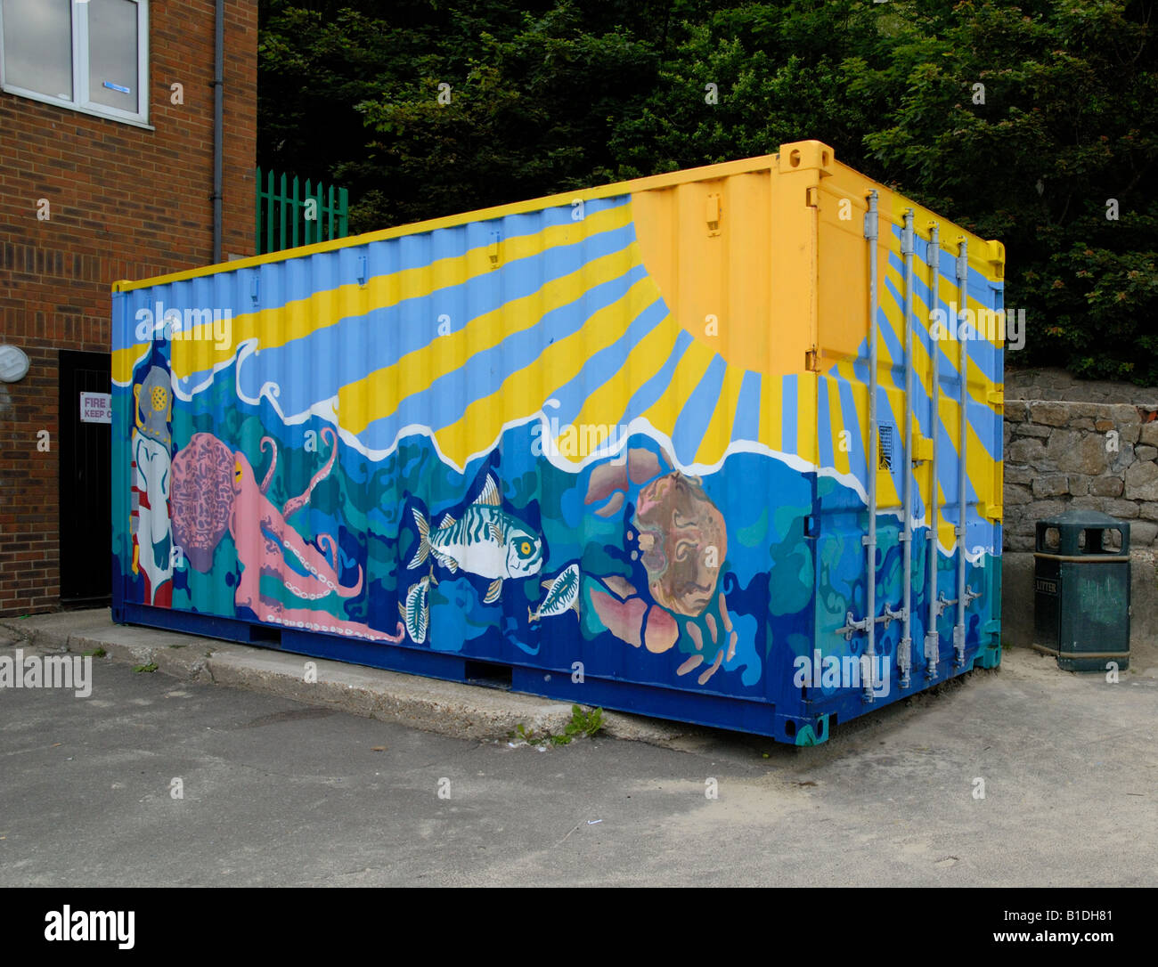 A brightly painted storage container on the seafront at Folkestone in