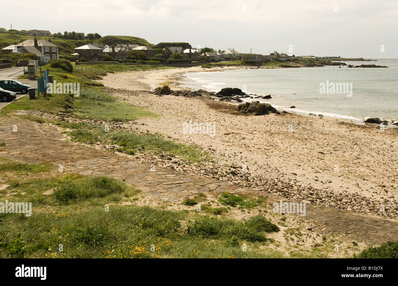 A view of the tiny coastal village of Macrahanish on the Mull of Kintyre. The village is home to a golf course and airport. Stock Photo