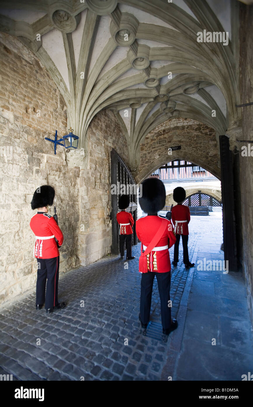 Guards on duty under the 'Traitor Tower' at the Tower of London, England, UK, Britain. Stock Photo