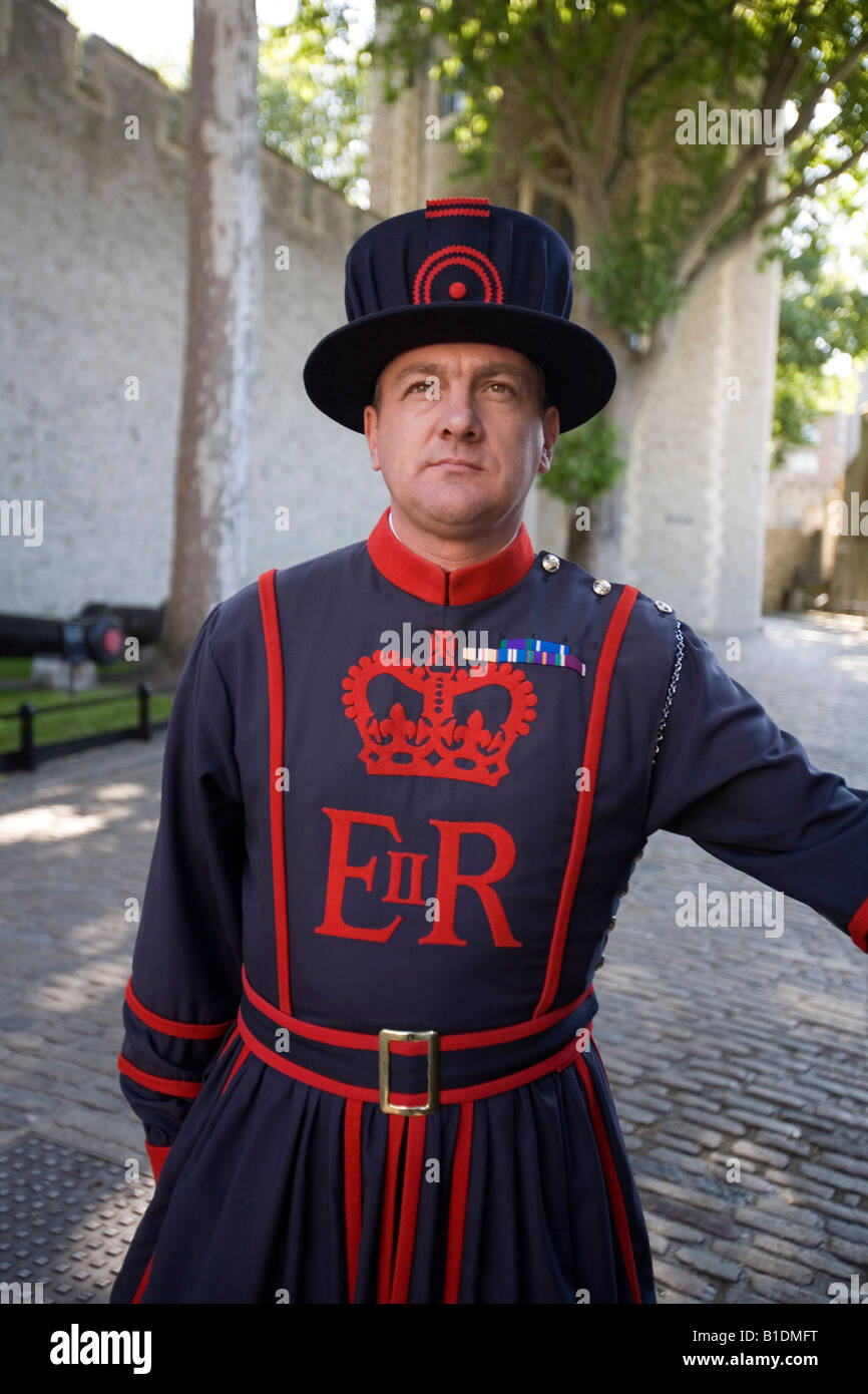 Beefeater Yeoman of the 'Guard Warder' in front at the 'Tower of London', England, Britain, UK. Stock Photo