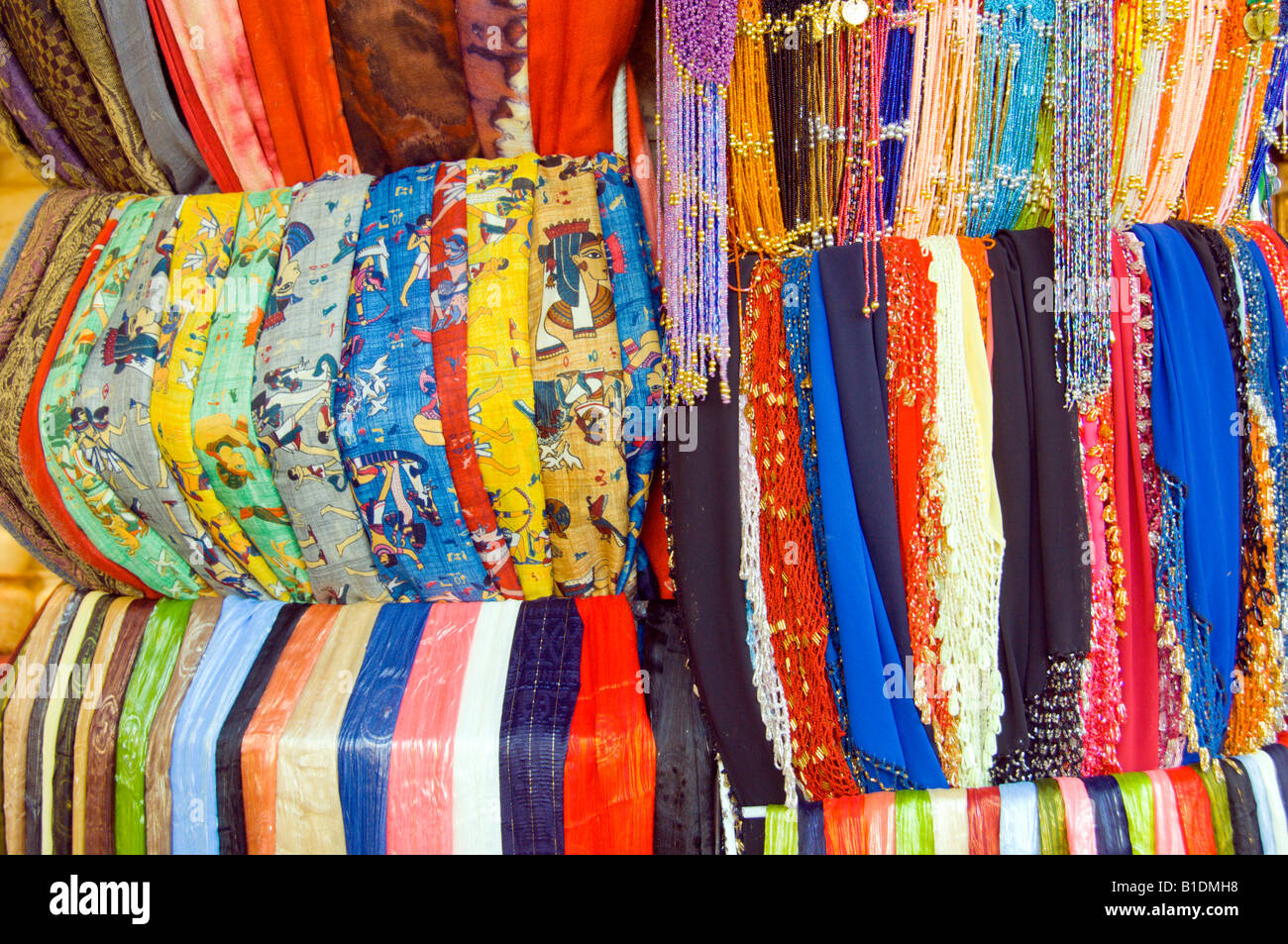 Egyptian textiles and cloth displayed in a tourist market shop in Abu Simbel Egypt Stock Photo
