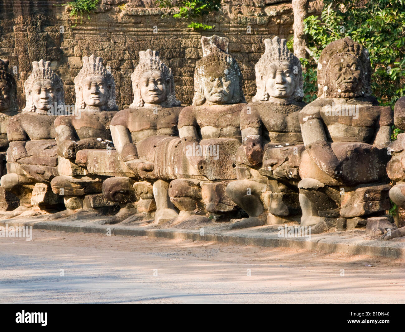 sculptures on right side leading to south gate, Angkor Thom, Cambodia Stock Photo