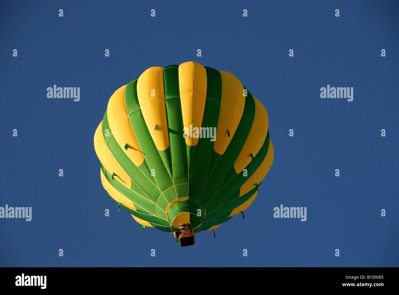 one hot air balloon in blue sky Stock Photo - Alamy