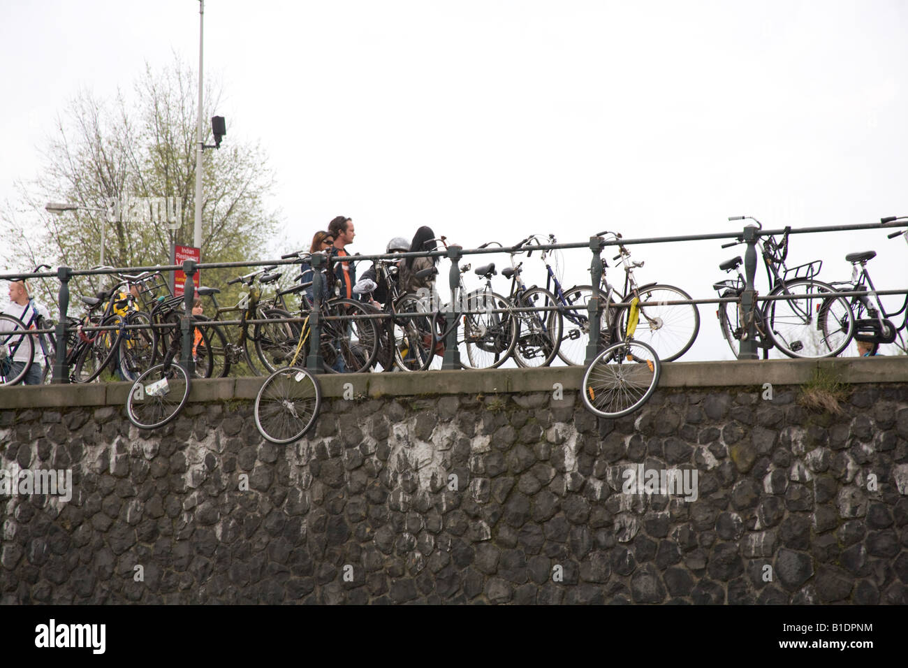 Canal Railing Bikes attached to canal railings Amsterdam Holland The Netherlands ...