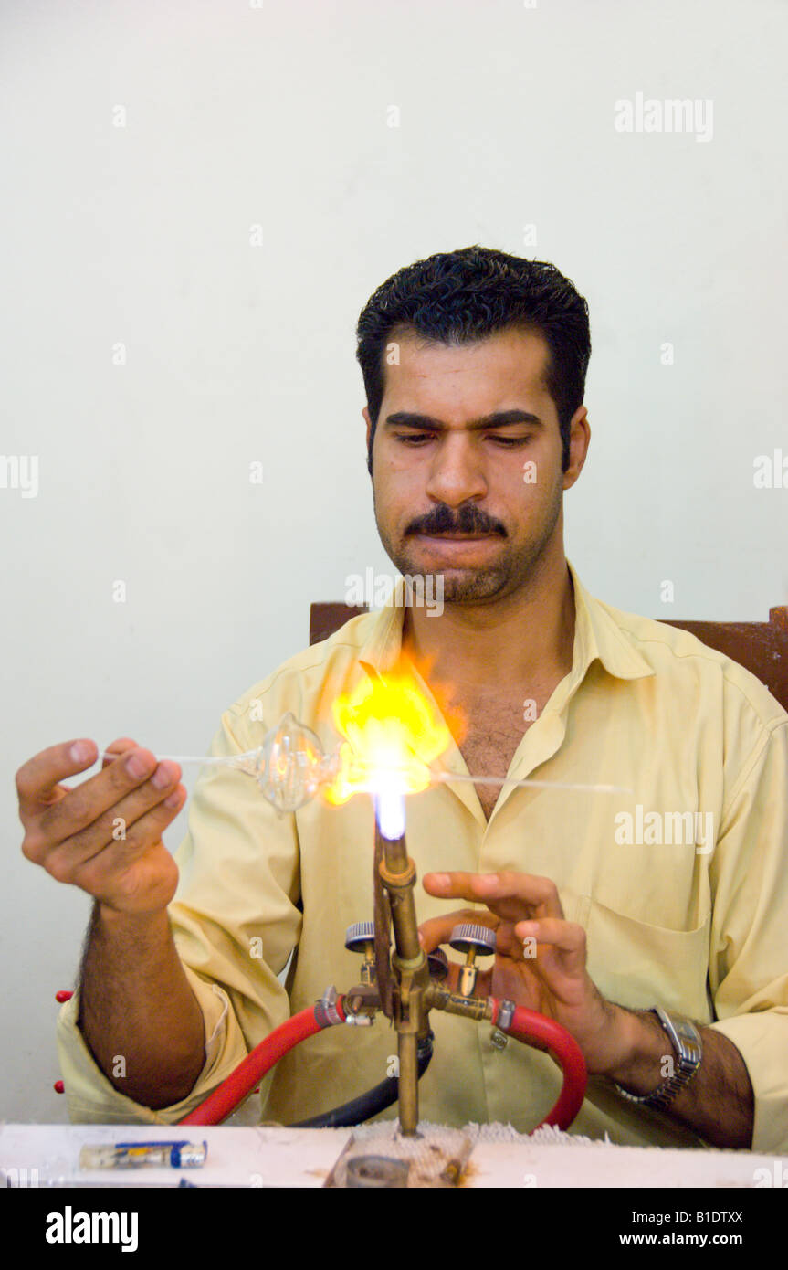 Egyptian eats nails, glass and teaches his children Egyptian eats nails, glass and teaches his children