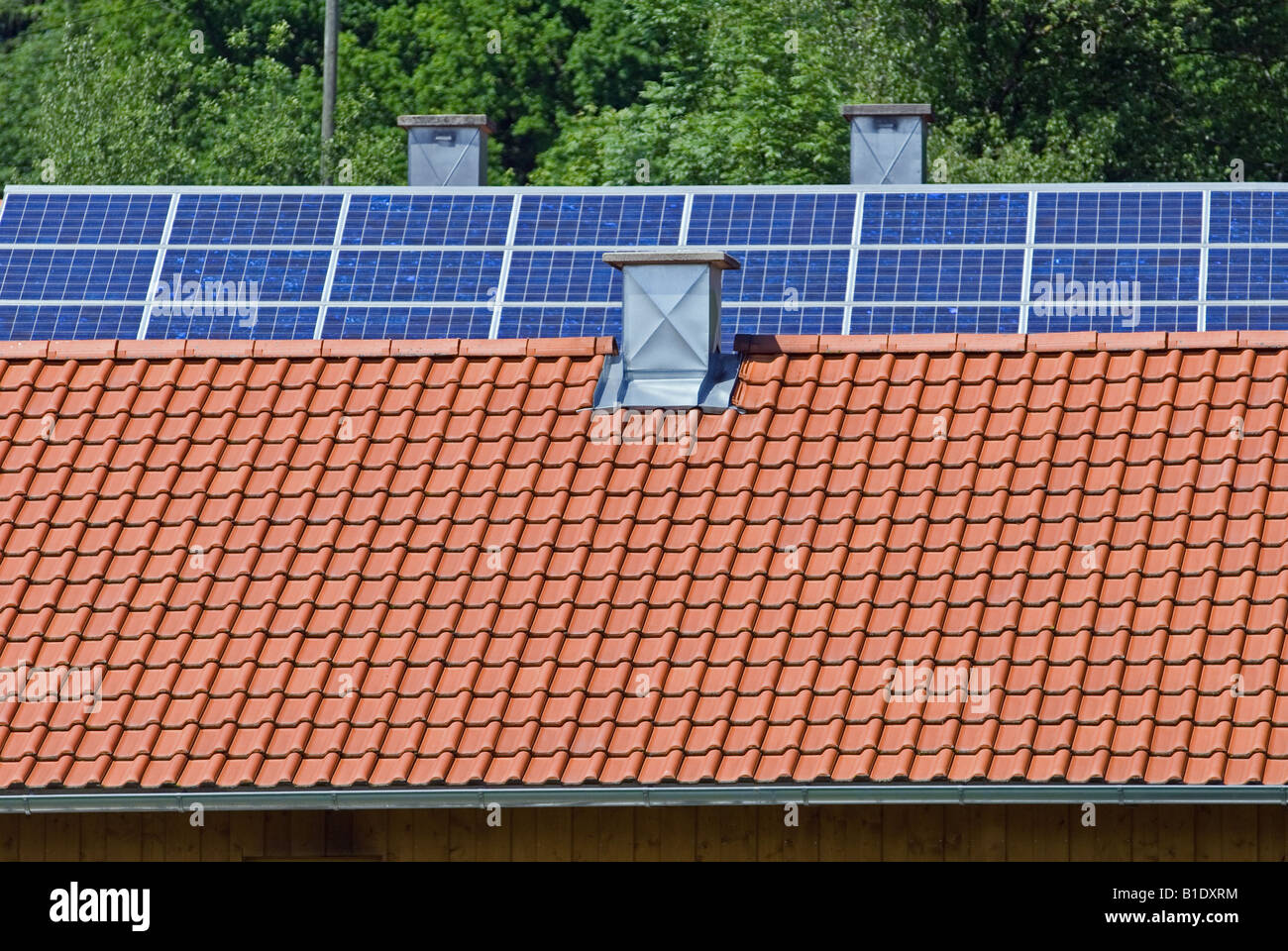 Solar panels fitted to the roof of a house near Waging, Bavaria