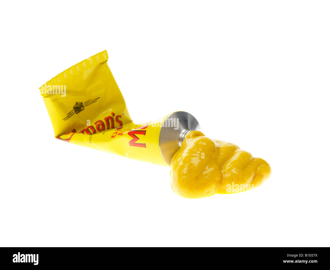 Tube Of Traditional Spicy Yellow English Mustard Isolated Against A