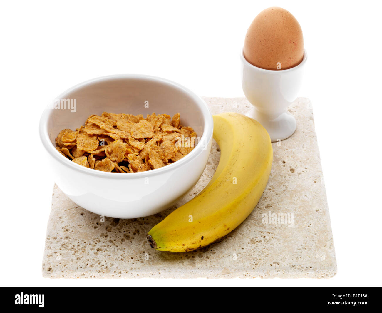 Healthy Breakfast Of Boiled Egg With Cereal And Banana Isolated Against