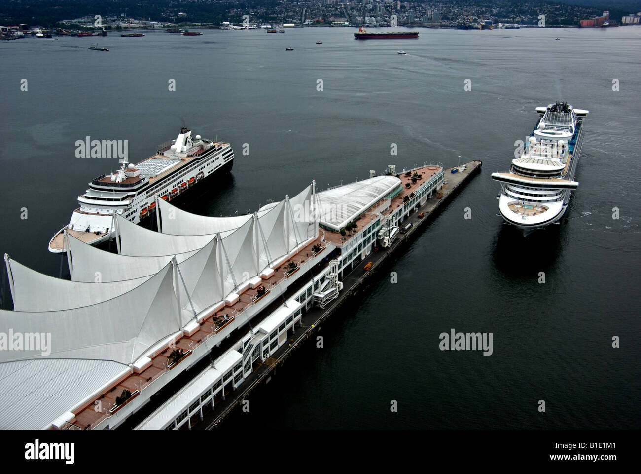 Aerial View Of Two Cruise Ships In Vancouver Harbour Coming Into Dock   Aerial View Of Two Cruise Ships In Vancouver Harbour Coming Into Dock B1E1M1 