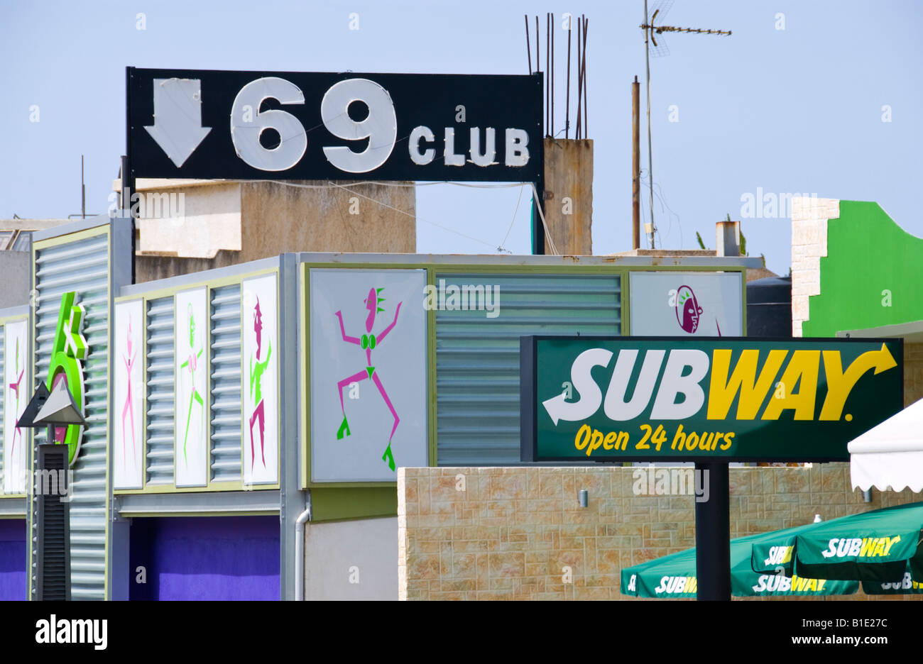 Sign for 69 CLUB and SUBWAY sandwich fast food bar in Malia on the Greek Mediterranean island of Crete Stock Photo