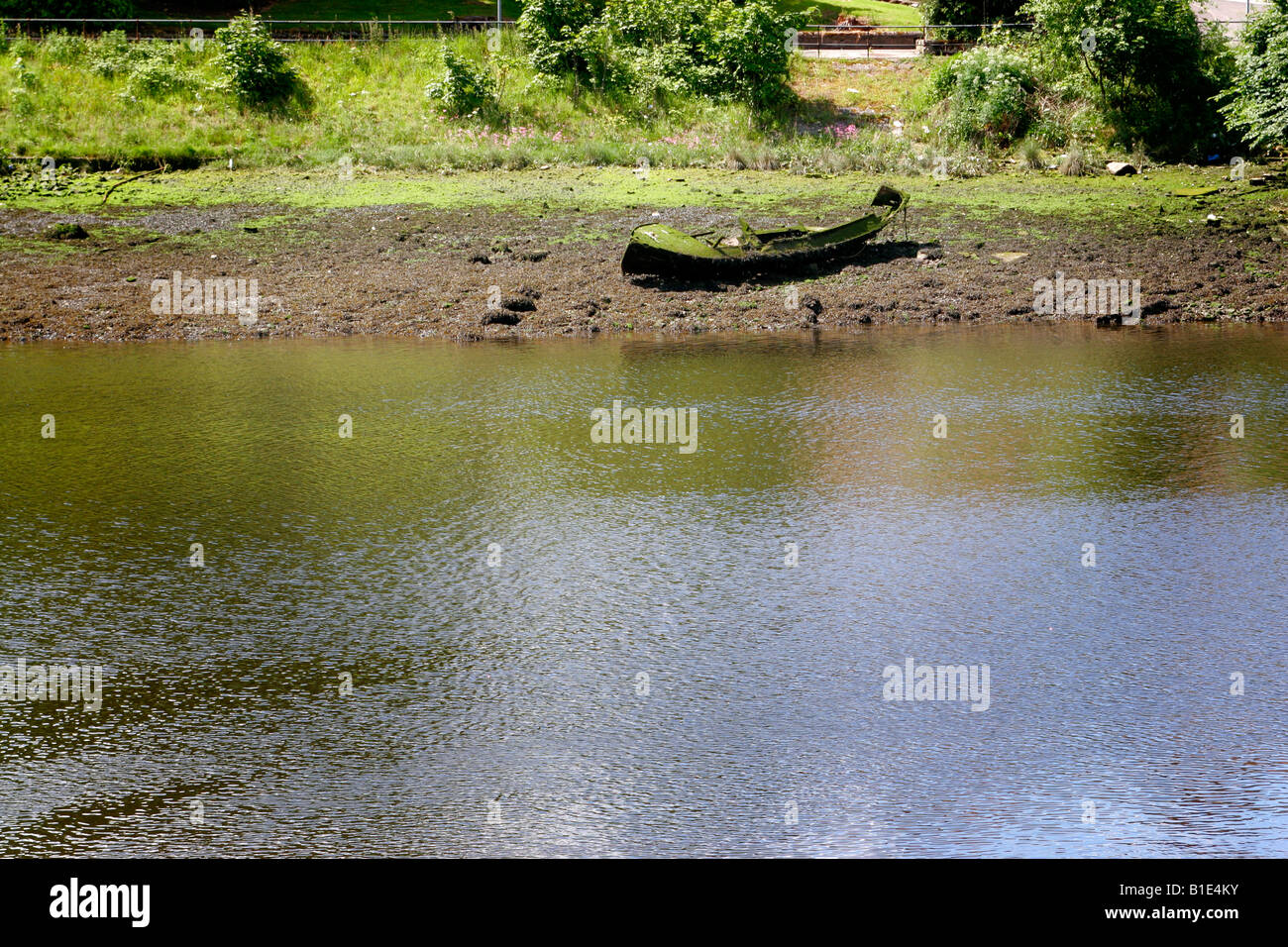 old wooden boat on riverbank Stock Photo - Alamy