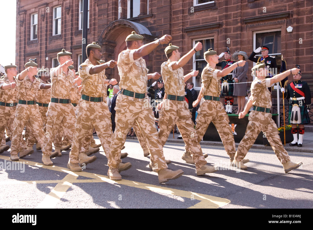 The Royal Regiment of Scotland soldiers marching through Dumfries town centre in desert fatigues after return from Iraqi Stock Photo