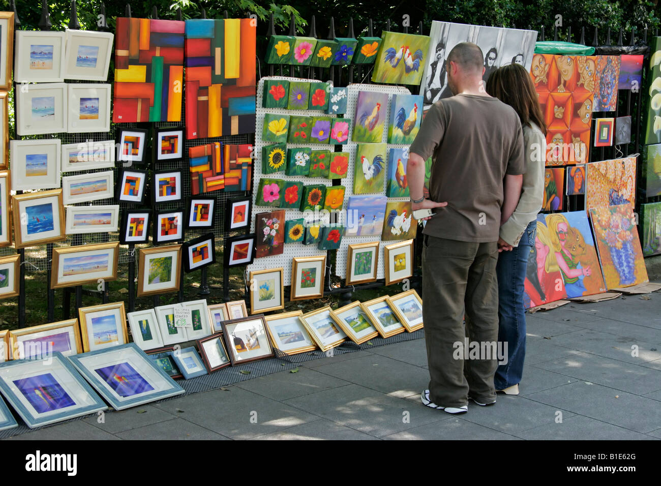 Art and paintings on sale by Irish artists on a street sidewalk