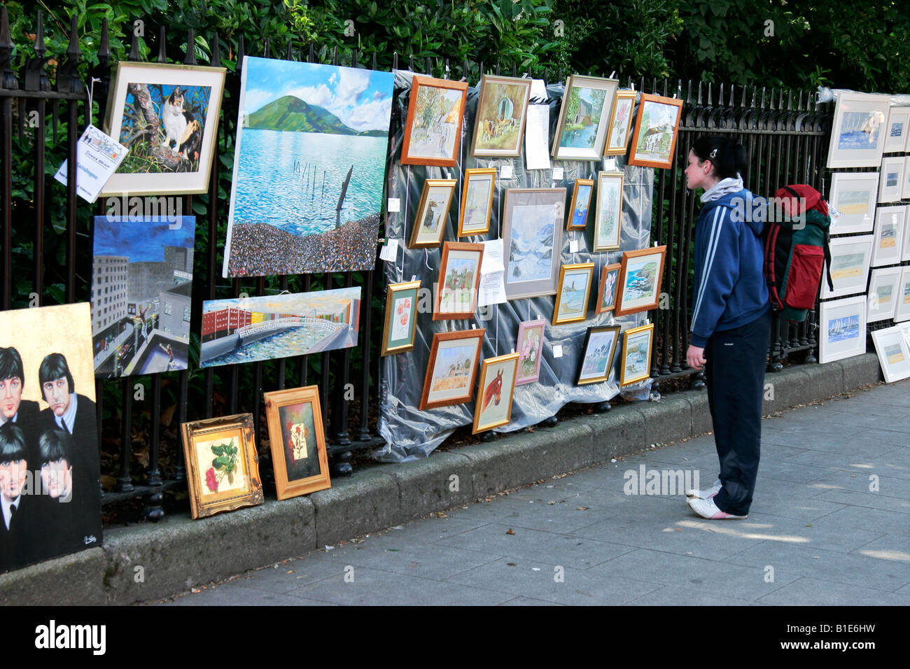 Art and paintings on sale by Irish artists on a street sidewalk