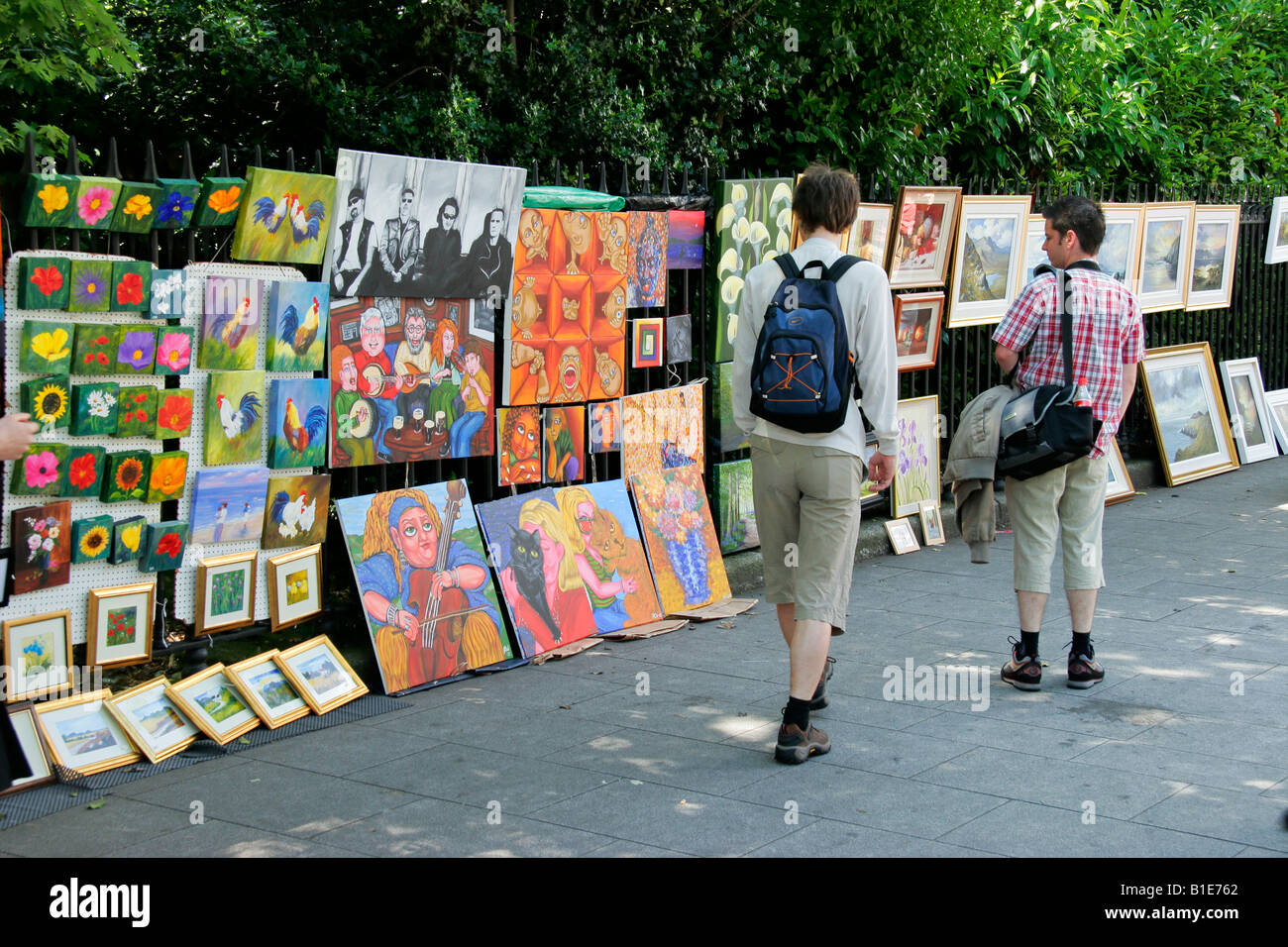 Art and paintings on sale by Irish artists on a street sidewalk