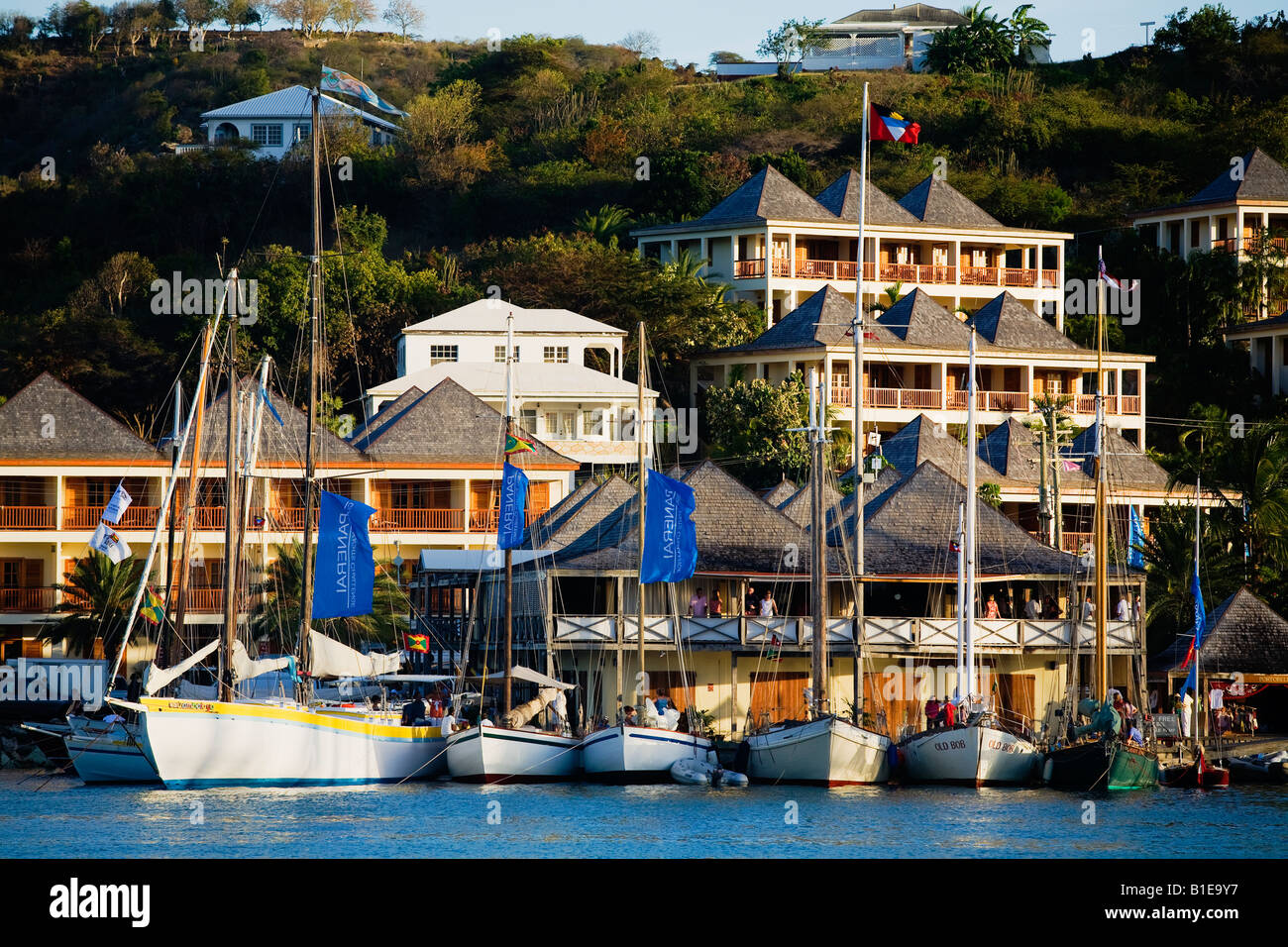 Traditional yachts line the dock at the Antigua Yacht Club in Falmouth