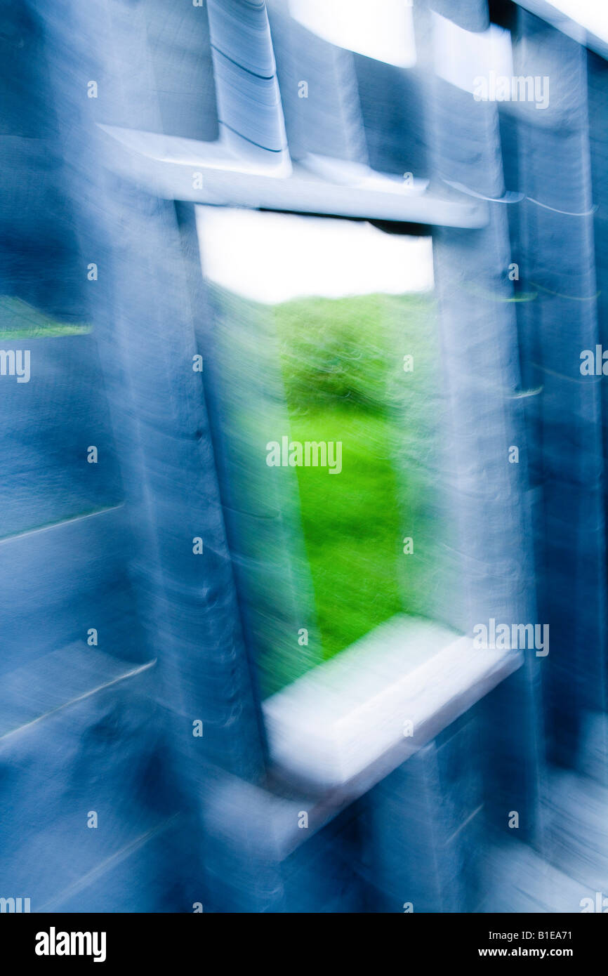 Abstract image through window in adandoned building motion blur Alaska Summer USA Stock Photo