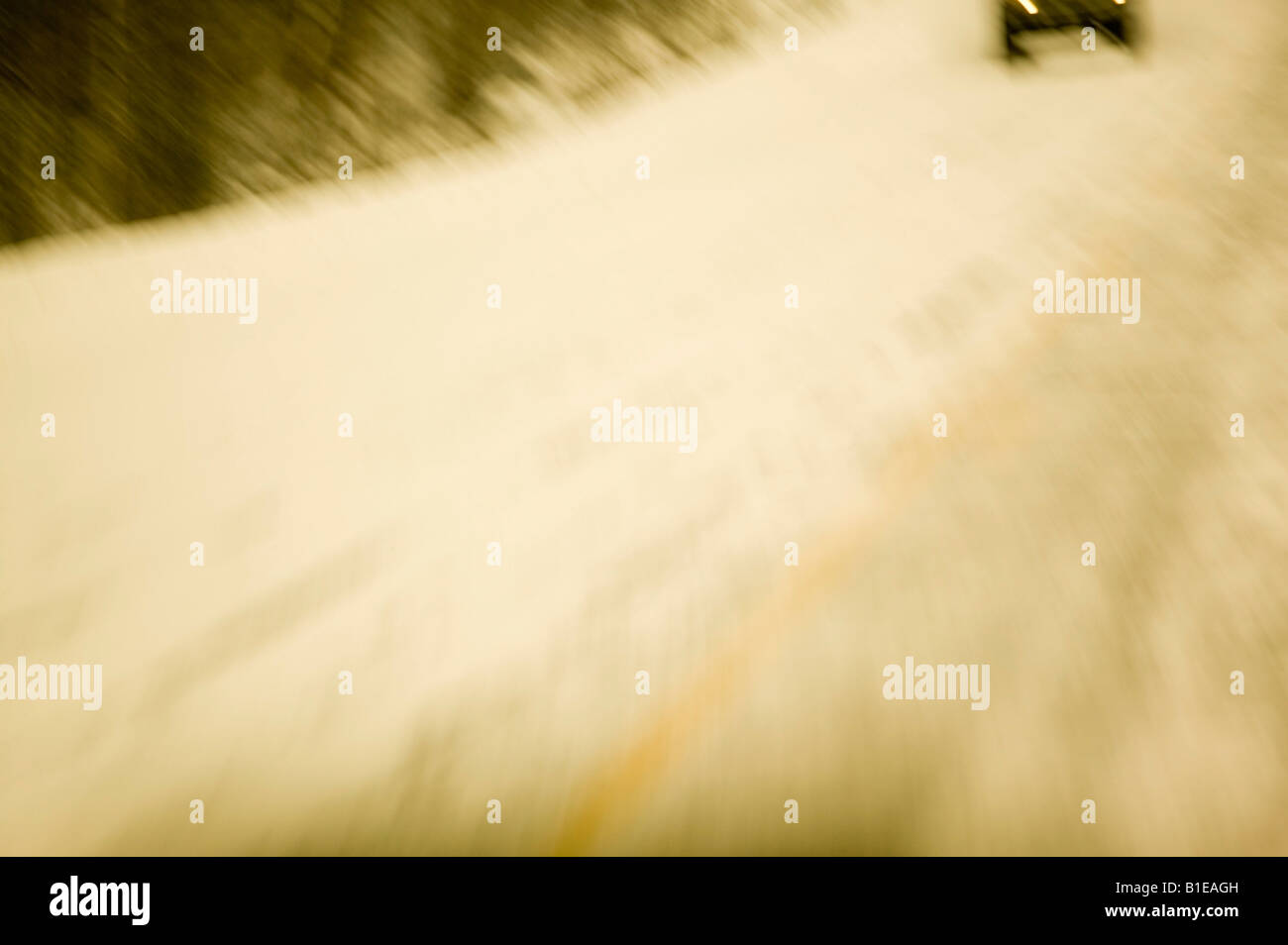 Blurred & abstract view of approaching car on highway Stock Photo - Alamy