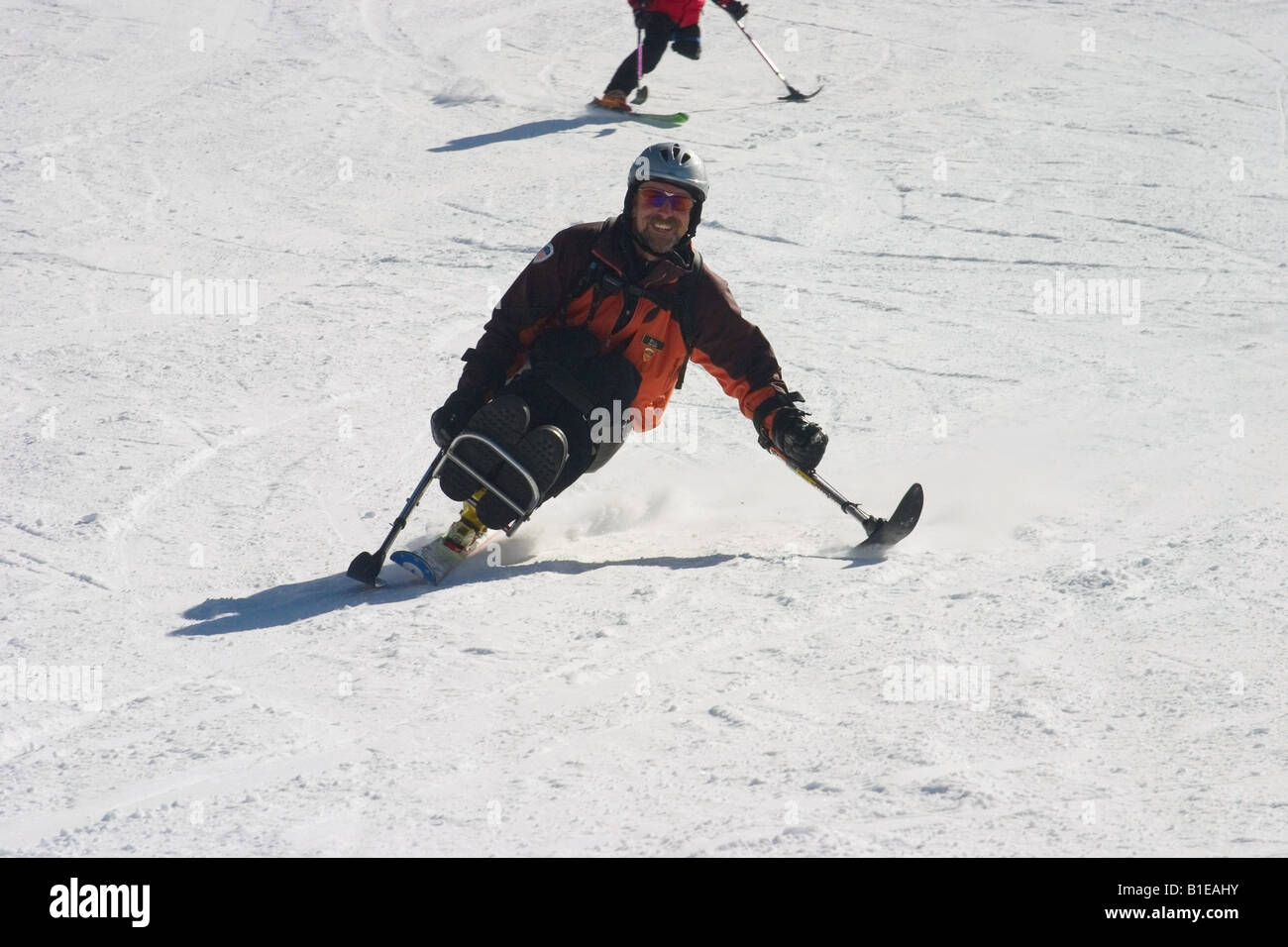 Pro Ski Instructor of America Demo Team skis on his mono-ski at Telluride Colorado Stock Photo