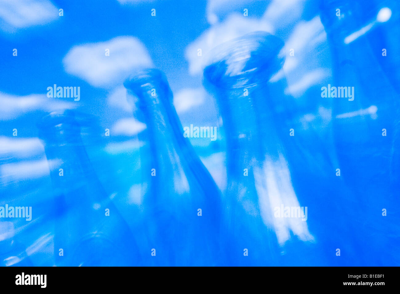 Abstract design bottles with blue sky background and blurred motion effect USA Stock Photo