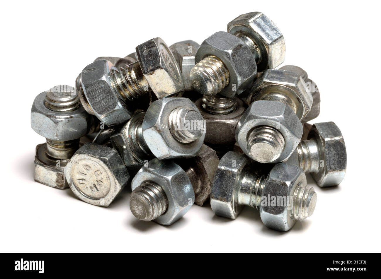 Pile of metal nuts and bolts Stock Photo