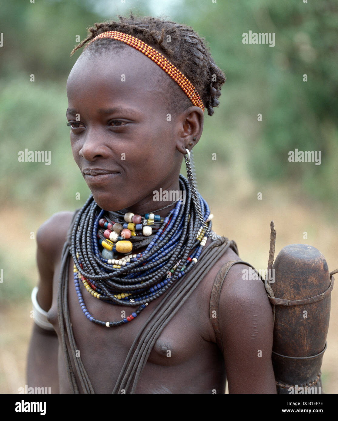 An attractive Dassanech girl. Her adornment is typical of the girls of her tribe. Stock Photo