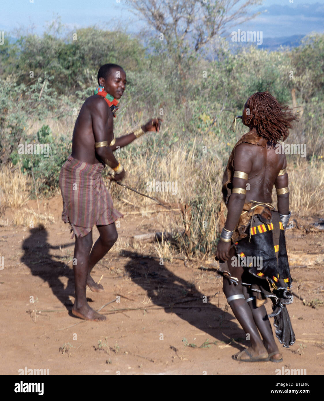 A Hamar woman being whipped duuring a Hamar 'Jumping of the Bull' ceremony. Stock Photo