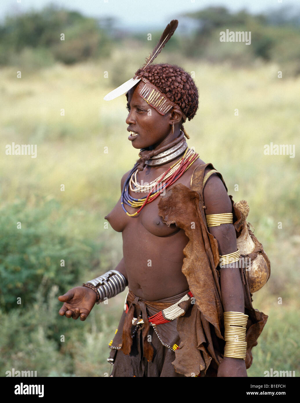 A Hamar woman of Southwest Ethiopia. The Hamar are semi-nomadic pastoralists whose richly-ochred women have striking styles. Stock Photo