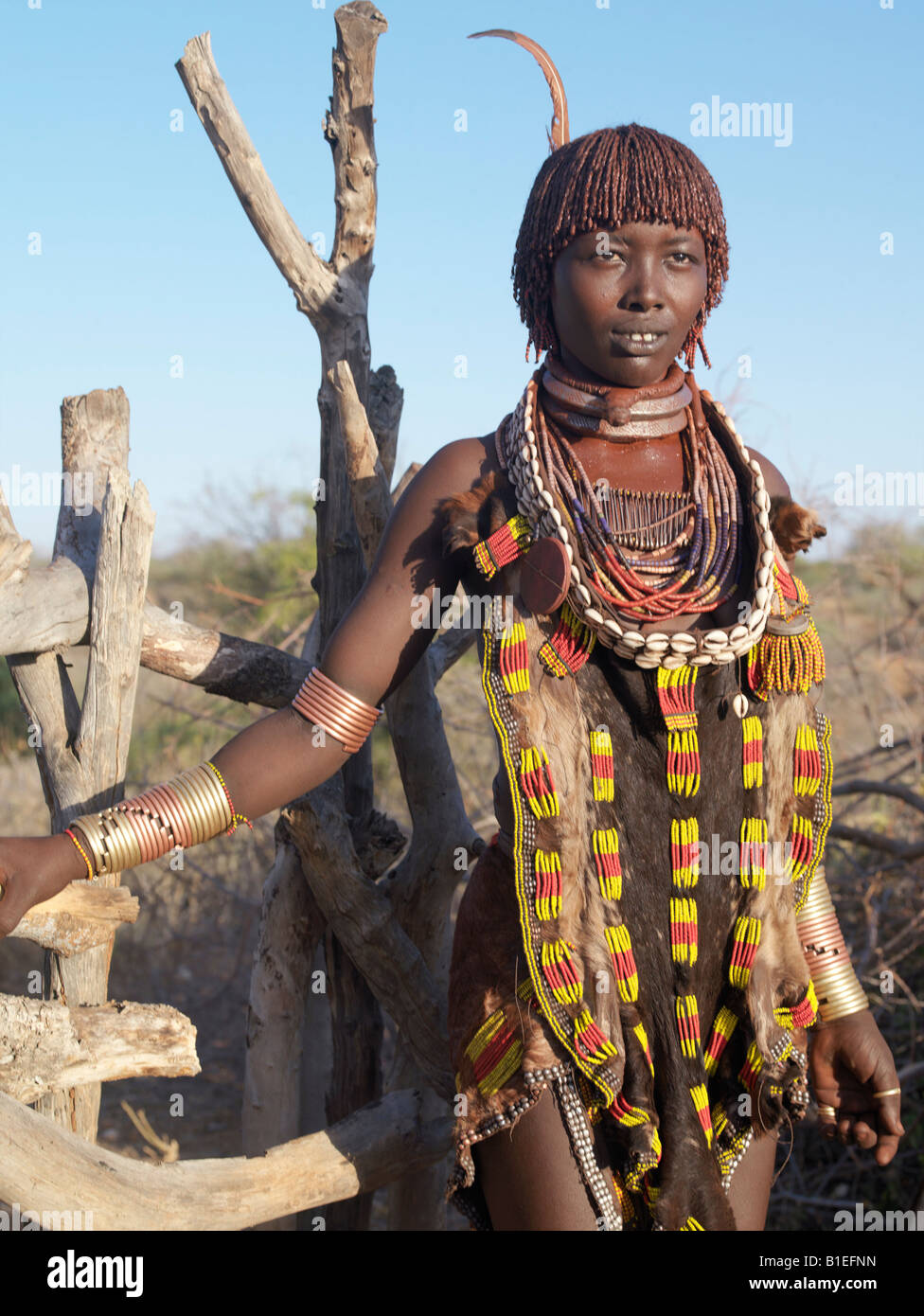 A Hamar woman at her homestead in the Hamar Mountains.The Hamar are semi-nomadic pastoralists of Southwest Ethiopia. Stock Photo