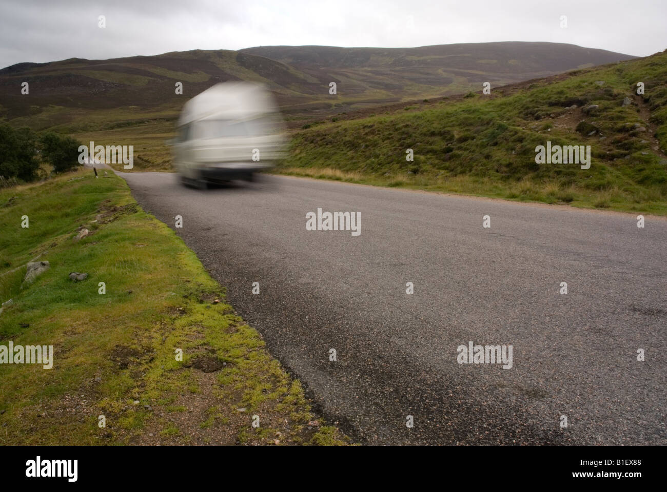 A camper van travels through the Scottish Highlands, UK Stock Photo - Alamy