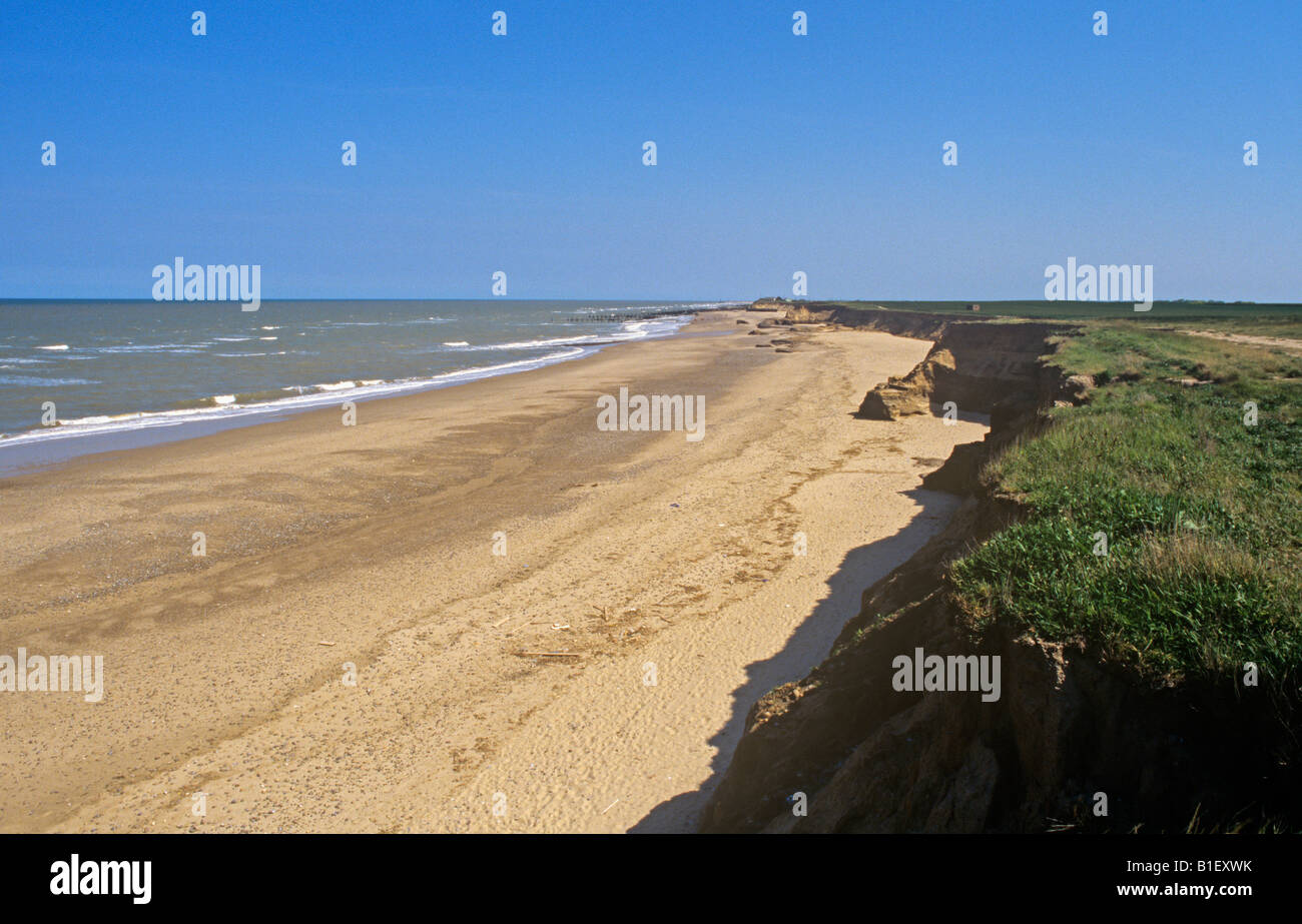 New bay and wide sandy beach to the south of Happisburgh created recently by sea defences failing Stock Photo