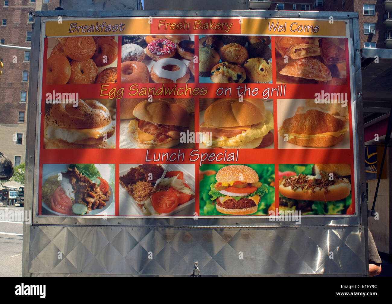 A food cart in the New York neighborhood of Chelsea advertises it s menu of unhealthy choices Stock Photo