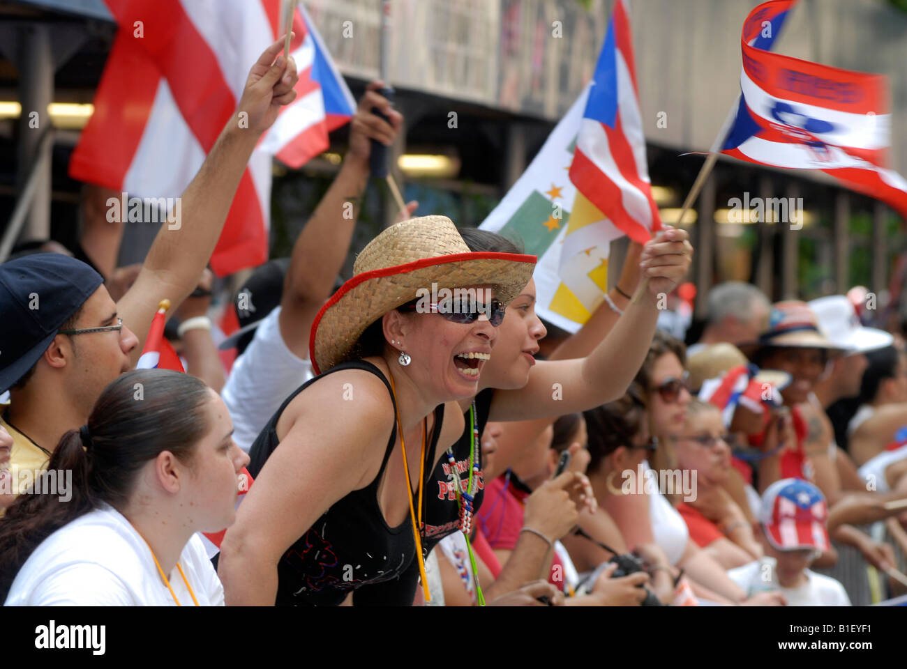 Spectators watch the 13th Annual National Puerto Rican Day Parade in New York on Fifth Avenue Stock Photo
