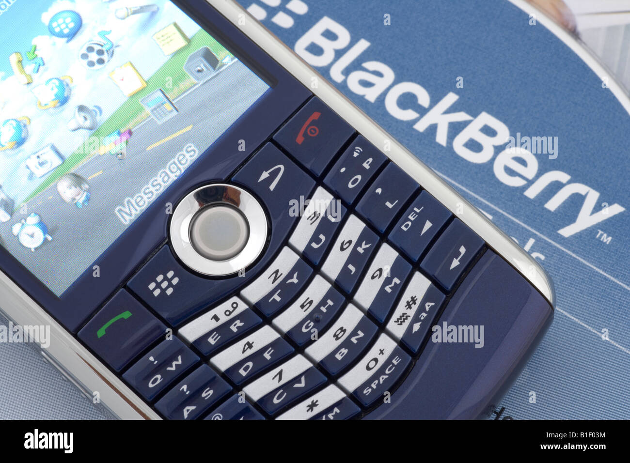 Close up photograph of mobile phone qwerty key keyboard Blackberry smartphone Stock Photo