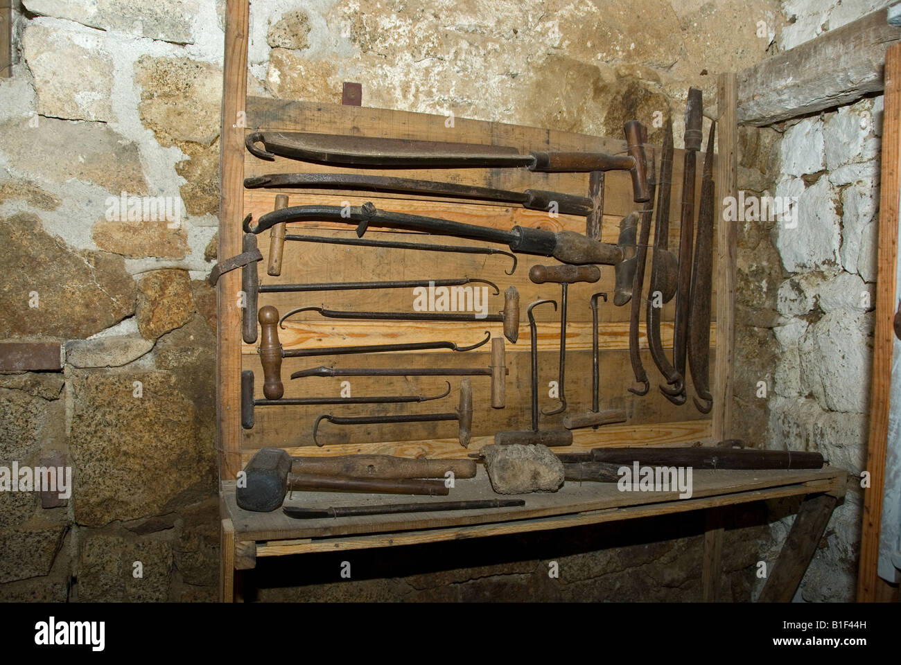 Stock photo of the tools inside the reconstructed cobblers shop in the village of Montrol Senard Stock Photo